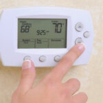 Digital AC thermostat showing incorrect temperature in a Dubai apartment
