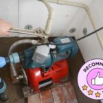 ProFix Dubai technician repairing a commercial water pump system in Al Quoz