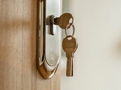 Front door lock showing signs of wear and security weakness in a Dubai home